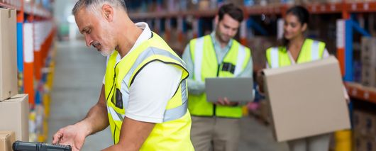 People in warehouse working