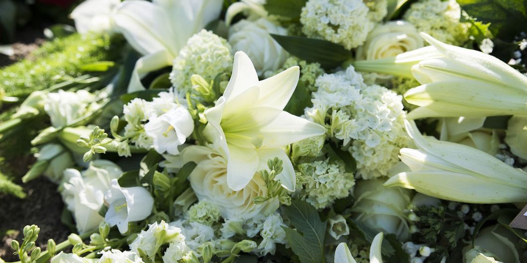 White orchid flowers, aj lock funerals Weston, burnham