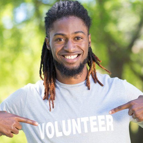 man wearing volunteer shirt