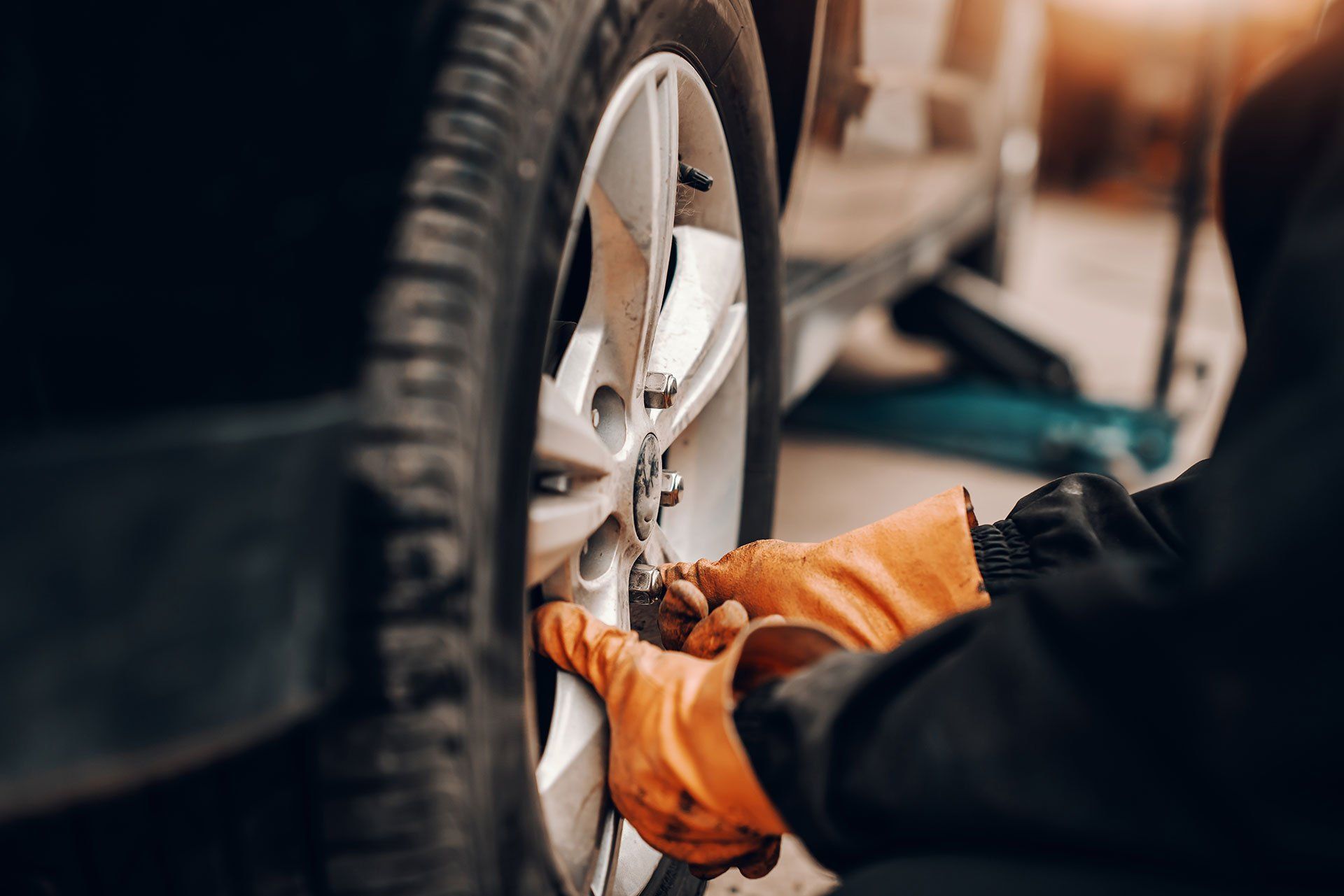 Mechanic Aligning The Wheel — Laredo, TX — Outlaw Wheels & Tires Mechanic Aligning The Wheel — Laredo, TX — Outlaw Wheels & Tires
