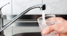 Drinking Water ─ Glass Of Water From Water Tap in Sag Harbor, NY Drinking Water ─ Glass Of Water From Water Tap in Sag Harbor, NY
