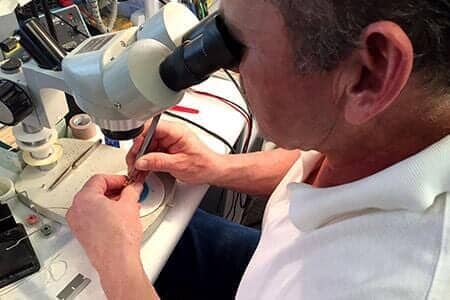 Hearing Aid Replacement — Making a Hearing Aid Under Microscope — Bend, OR Hearing Aid Replacement — Making a Hearing Aid Under Microscope — Bend, OR