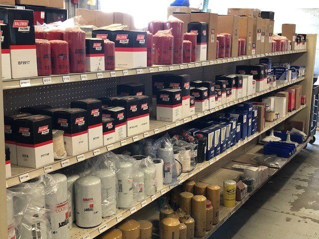 Truck Parts On Racks | Monroe, WA | Kenny’s Truck Parts & Repair