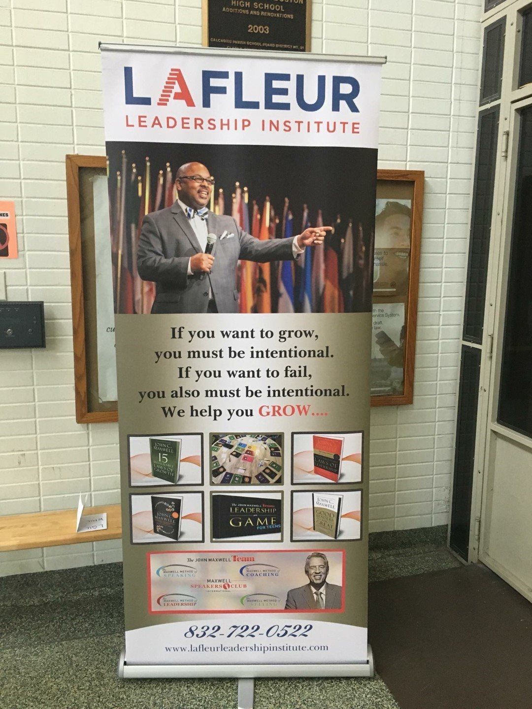 A lafleur leadership institute banner with a man pointing