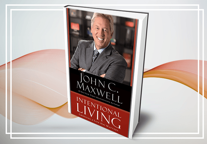A book titled intentional living by john c. maxwell