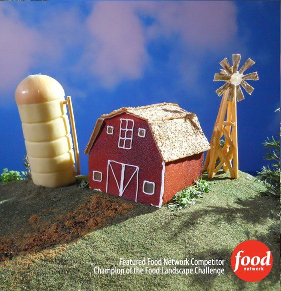 A picture of a red barn and a windmill from food network