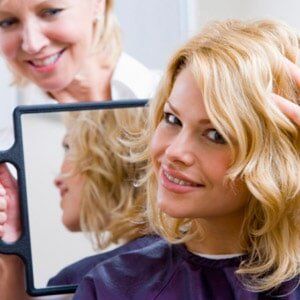 Hairdresser Holding Mirror for Woman - Hair Salon in Manville, NJ Hairdresser Holding Mirror for Woman - Hair Salon in Manville, NJ