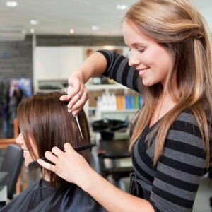 Hairdresser Cutting Client's Hair - Beauty Salon in Manville, NJ Hairdresser Cutting Client's Hair - Beauty Salon in Manville, NJ