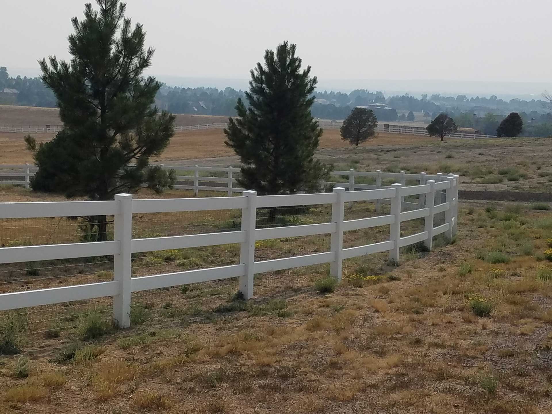 White Vinyl Fence — Elizabeth, CO — Estate Fence Supply White Vinyl Fence — Elizabeth, CO — Estate Fence Supply