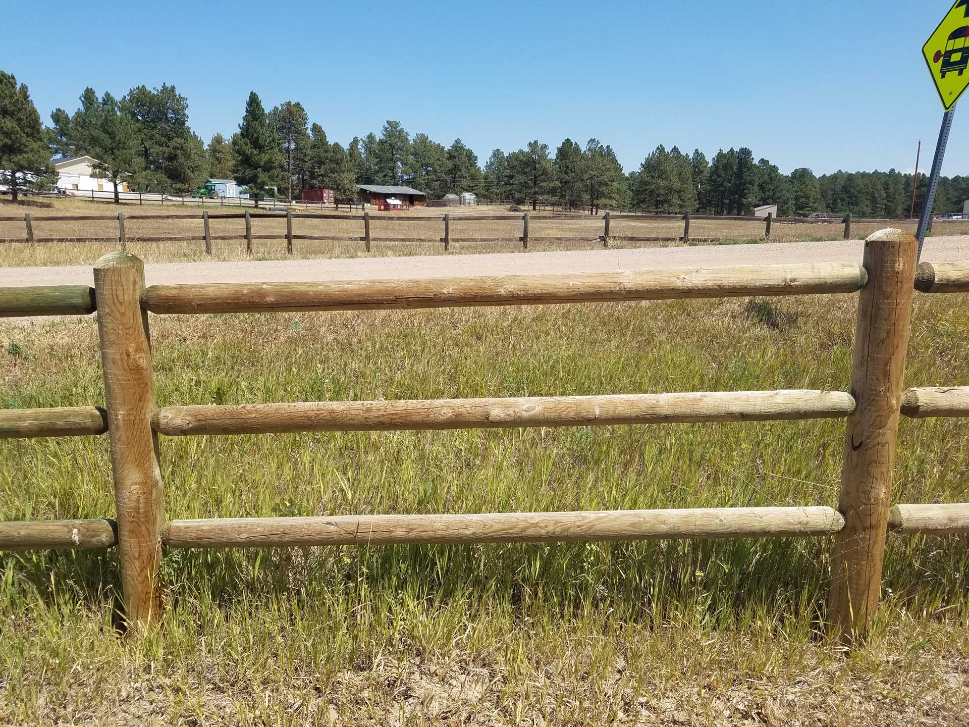 Secured White Fence — Elizabeth, CO — Estate Fence Supply Secured White Fence — Elizabeth, CO — Estate Fence Supply