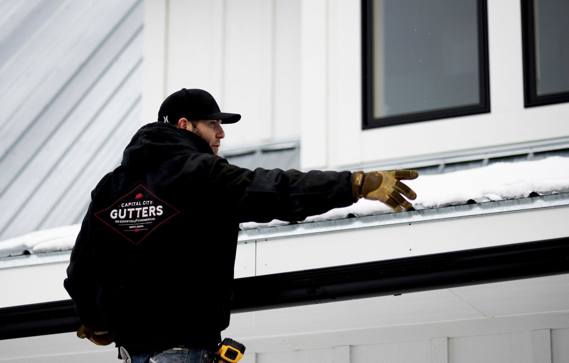 person working on roof