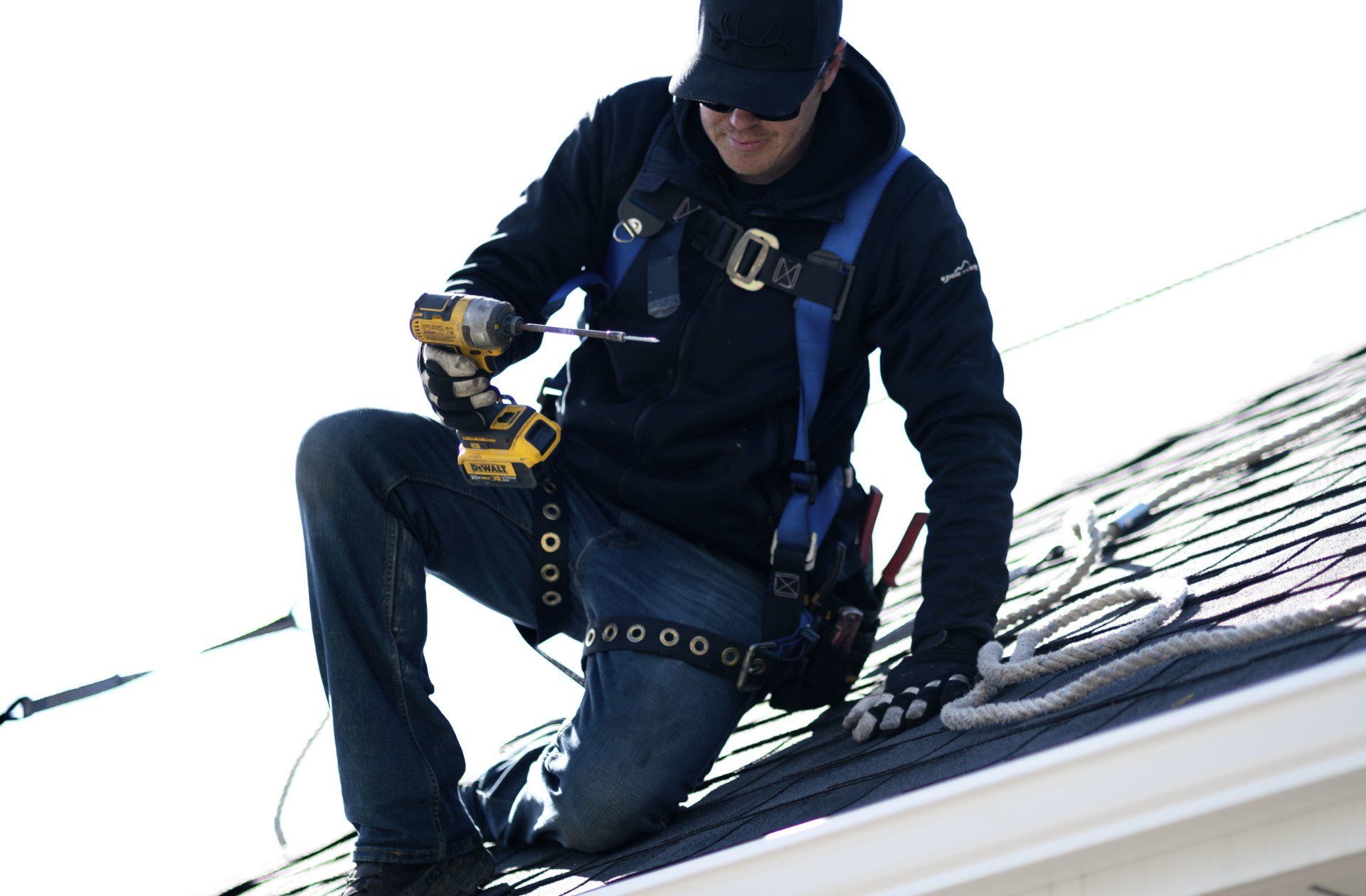person working on roof