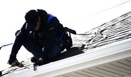 Seamless gutters being installed