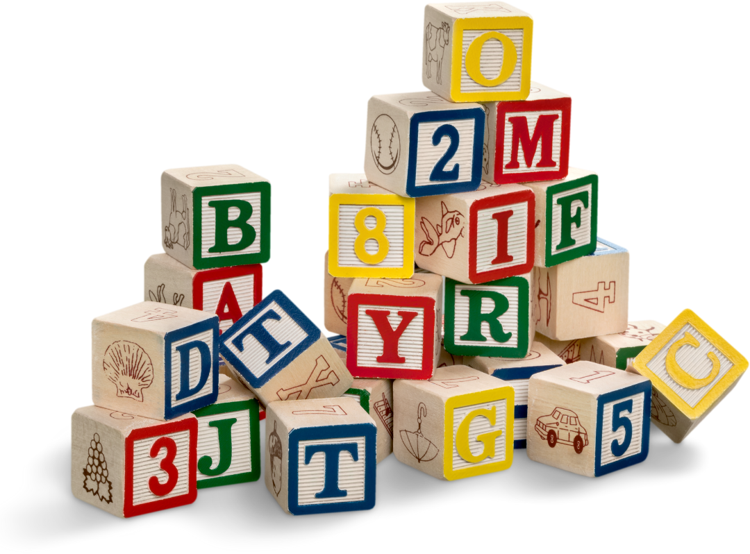 Stack of colorful alphabet blocks arranged in a pyramid on a white background