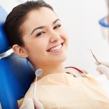 Woman smiling with perfect teeth — Dental Services in Virginia Beach, VA Woman smiling with perfect teeth — Dental Services in Virginia Beach, VA