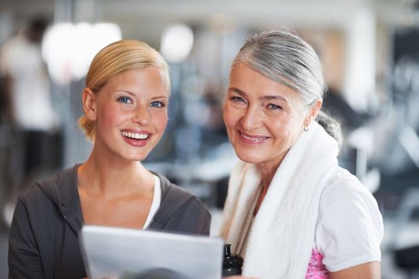 Personal Trainer taking induction with woman — Fitness in Wayne,PA Personal Trainer taking induction with woman — Fitness in Wayne,PA