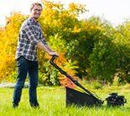 Lawn Mower Repair — Young Man Mowing the Grass in Brandon, VT Lawn Mower Repair — Young Man Mowing the Grass in Brandon, VT