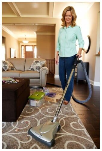Woman Vacuuming Carpet — Baldwin, MD — JPI Services Woman Vacuuming Carpet — Baldwin, MD — JPI Services