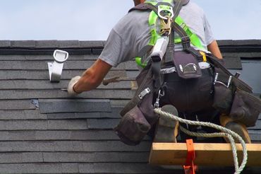 Repair Man on the Roof — Decatur, AL — J.W. Scott Construction Repair Man on the Roof — Decatur, AL — J.W. Scott Construction