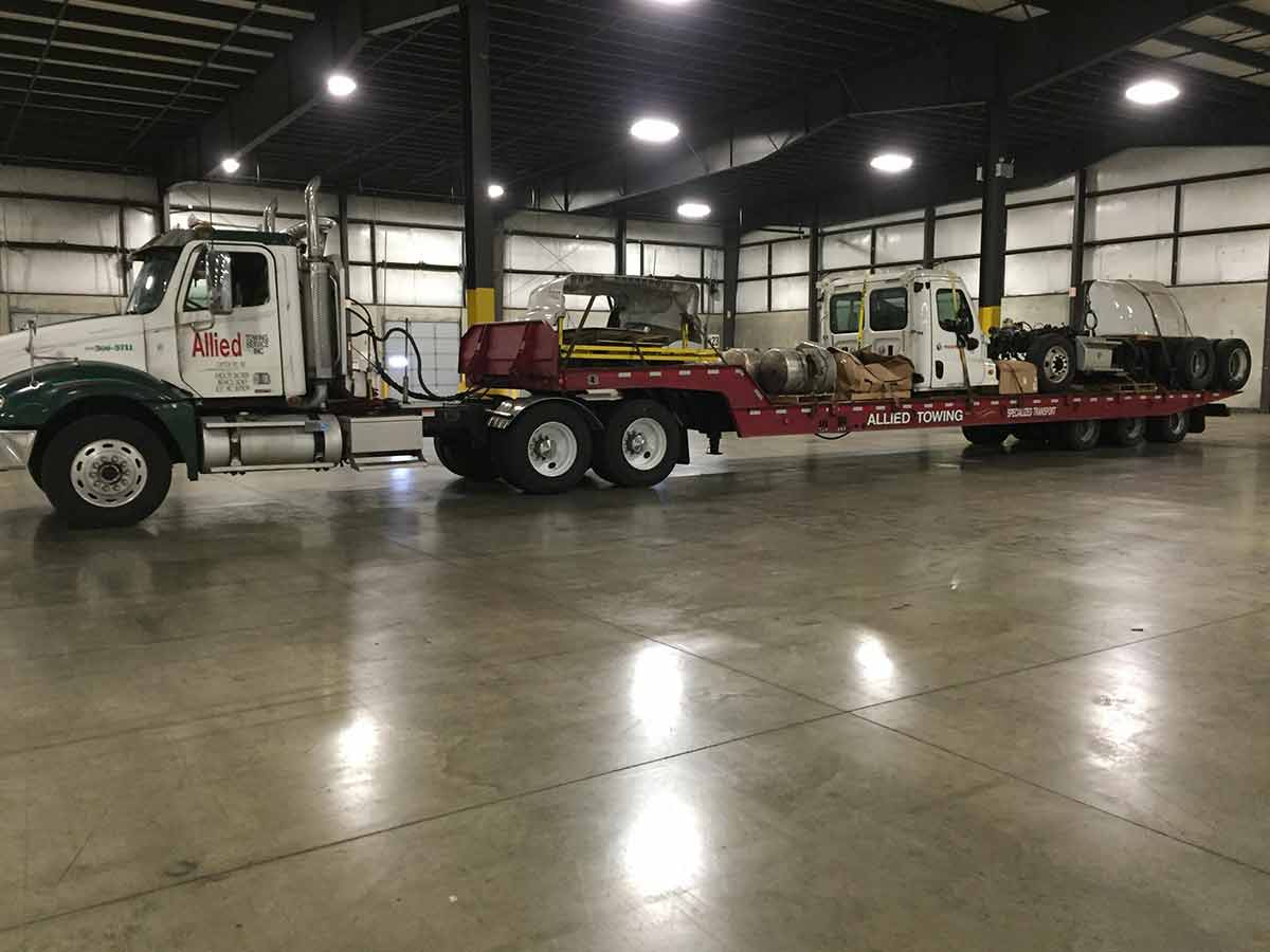 Truck Towing Vehicle — Company Towing Truck in Detroit, MI