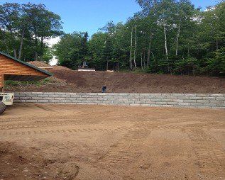 Excavating — Dirt Road with Excavator Trails in Marquette, MI