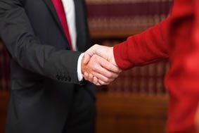 Lawyer Giving a Handshake to Client — Criminal Defense Attorneys in Park Ridge, IL Lawyer Giving a Handshake to Client — Criminal Defense Attorneys in Park Ridge, IL