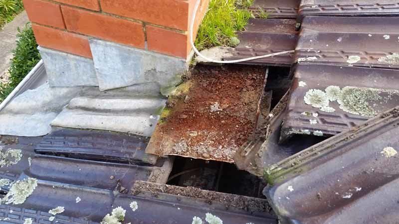 damaged roof with holes in it
