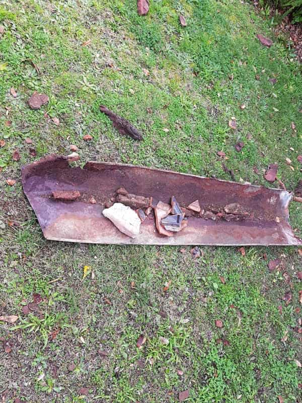 piece of damaged roof of grass
