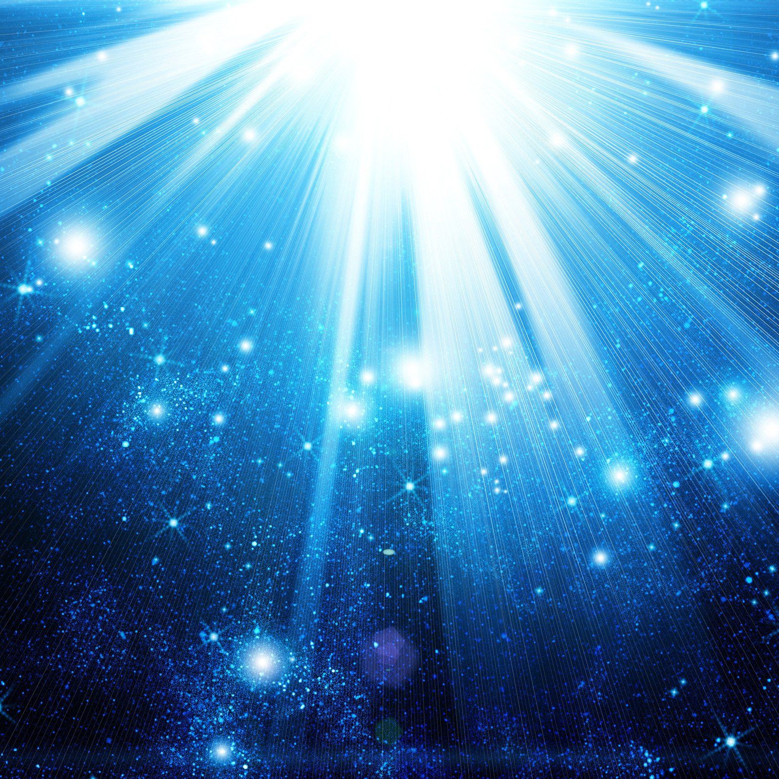 Blue sparkling starfield with bright white light rays bursting from the top center