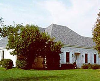 Gray Roof House — Roofing And Siding in Toledo, OH