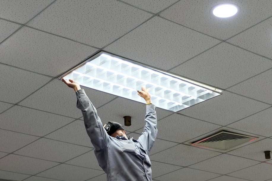 Installing Fluorescent Lamp — Electrical Services in Jensen, QLD