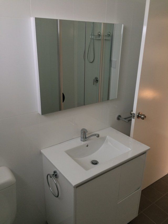 bathroom sink and mirror