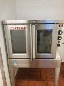 Stainless steel Blodgett convection oven with two doors and controls on the right.