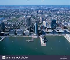 Aerial view of Jersey City waterfront with skyscrapers and city backdrop.