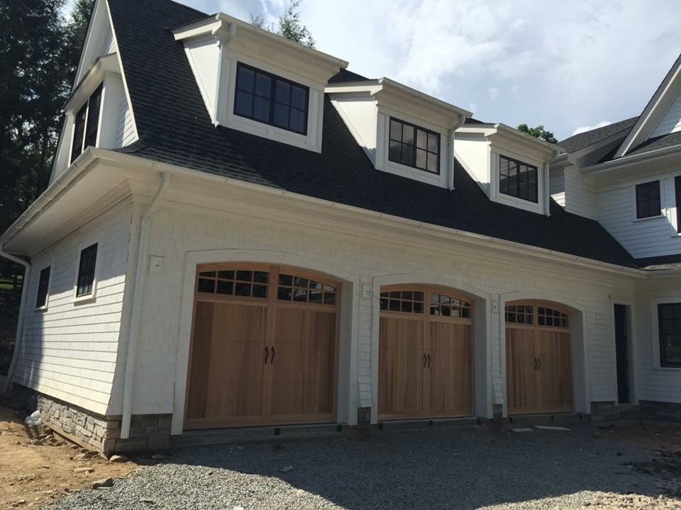 Series of Three Stained Garage Doors
