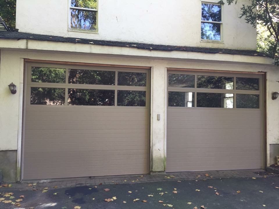 Brown Garage Doors Featuring Large Windows