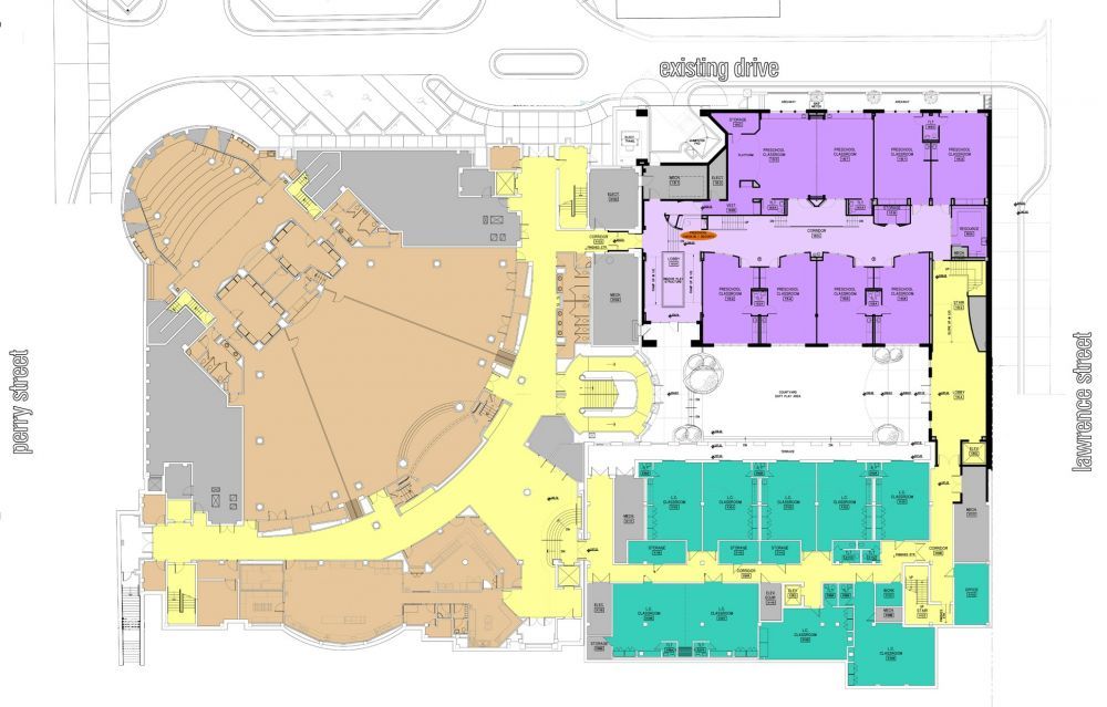 Floor plan: Building with yellow, beige, green and purple sections; streets labeled