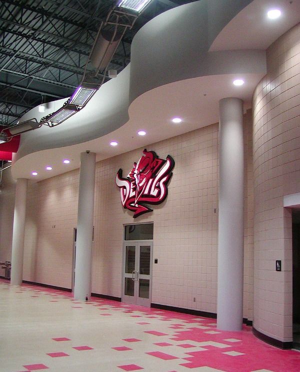 Entrance of a school hall with a large red