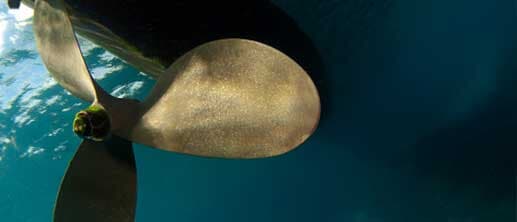 Underside of a boat propeller in water — Boat Shafting Company in Clinton Township, MI