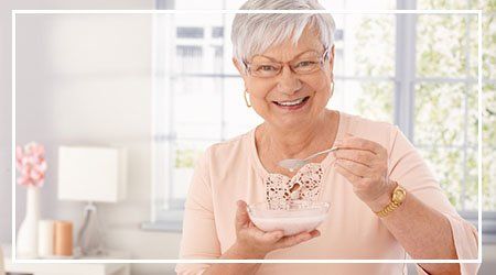 Happy Senior Woman — dental implants in Fredericksburg, VA Happy Senior Woman — dental implants in Fredericksburg, VA