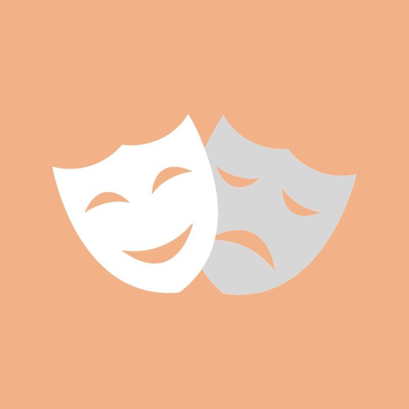 Un par de máscaras de comedia y tragedia sobre un fondo rosa.