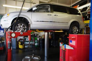 Minivan on a lift - Auto Repair and Maintenance in Lakewood, Colorado Minivan on a lift - Auto Repair and Maintenance in Lakewood, Colorado