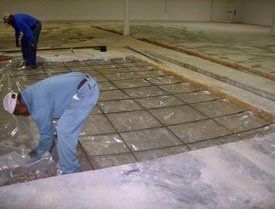 Man Pouring Concrete Slabs — Tucker, GA — Norton Civil Construction