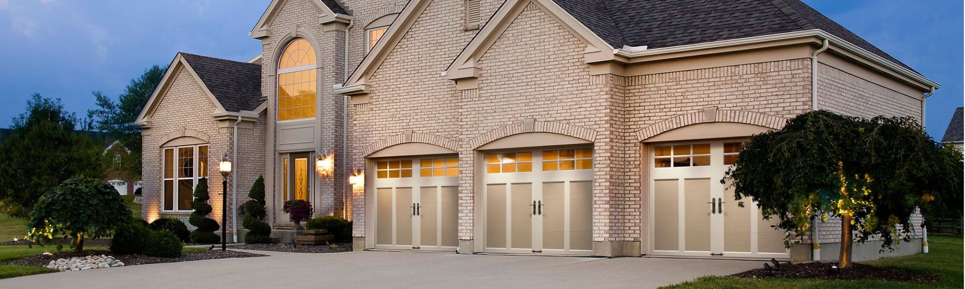 Three white garage doors. Three white garage doors.