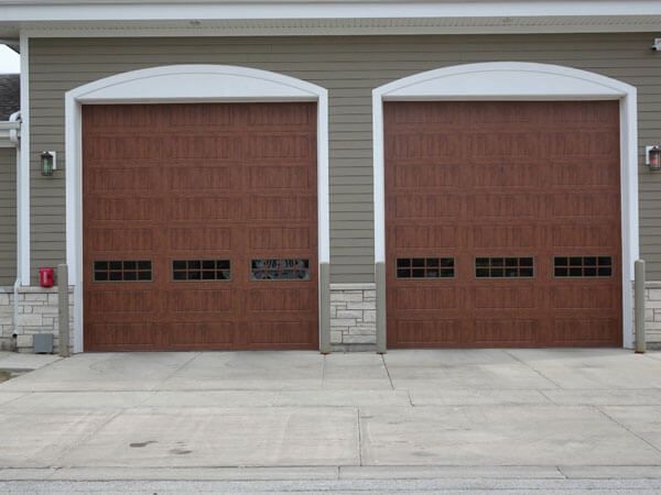 Dark Red Wood Garage Door — Big Rock, IL | J&D Door Sales Inc.