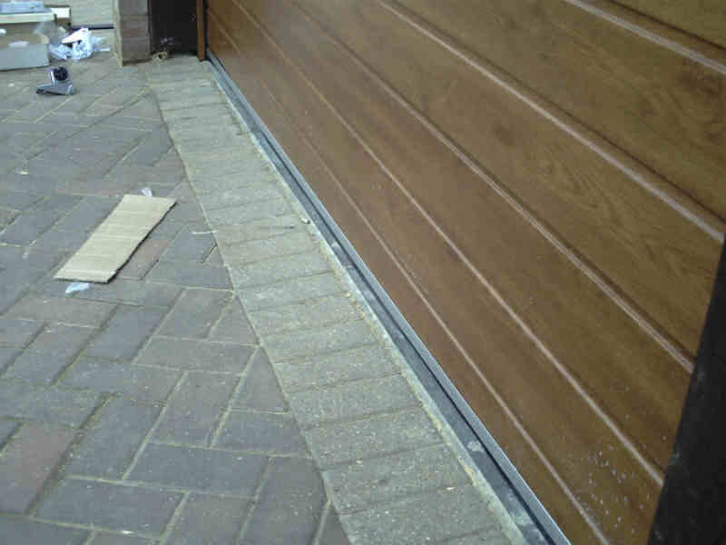 Four Carteck Golden Oak sectional doors