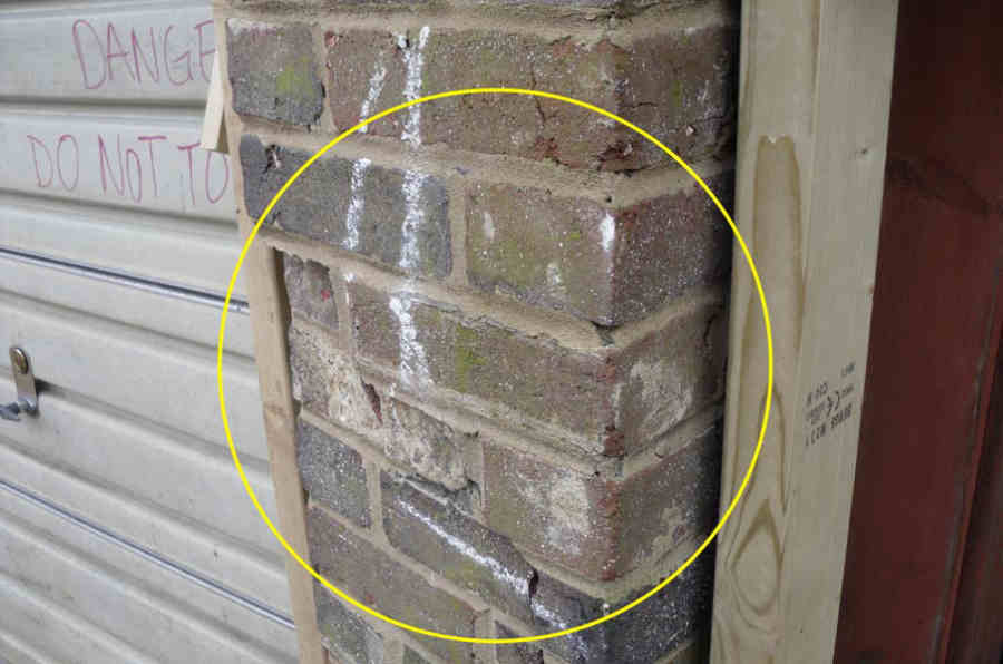 damaged garage block