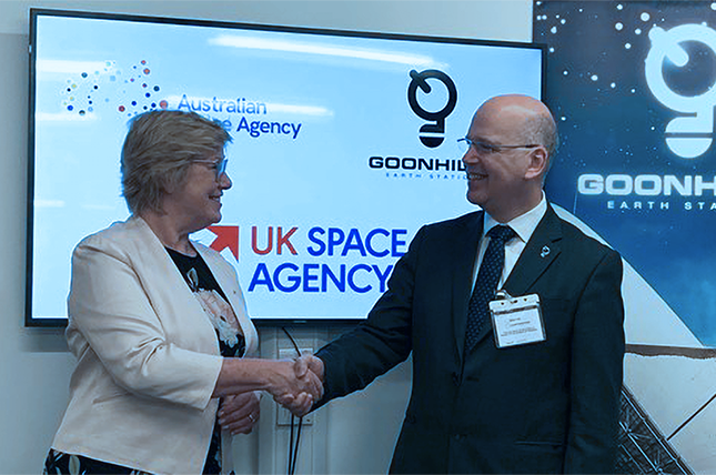Ian Jones shakes hands in Anglo/Australian partnership