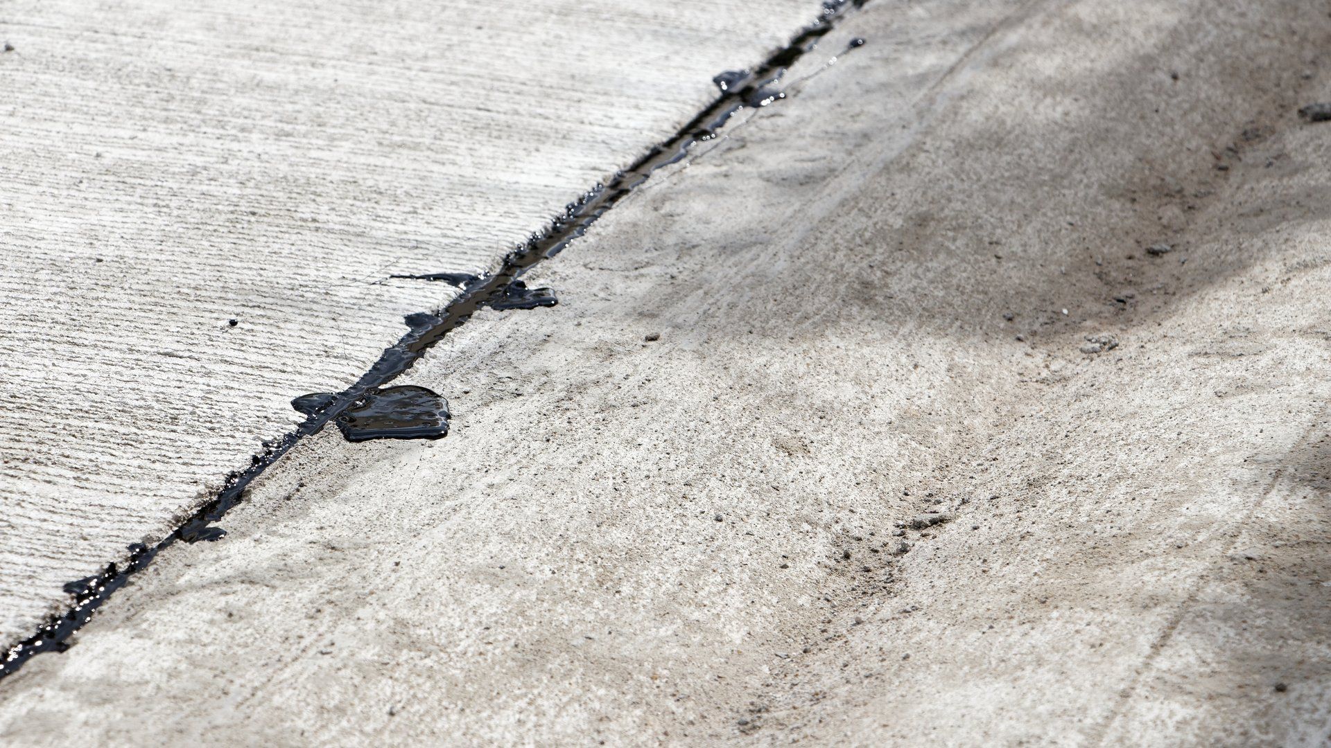 Pothole Repair and Crack Sealing in Kalamazoo, MI | All Phase Asphalt and Chip Seal Pothole Repair and Crack Sealing in Kalamazoo, MI | All Phase Asphalt and Chip Seal