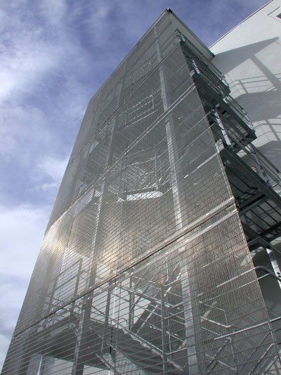 Staircase mesh cladding
